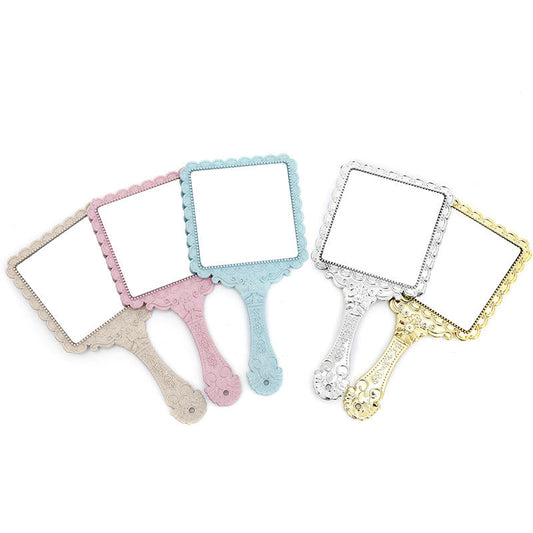 square antique hand mirror
