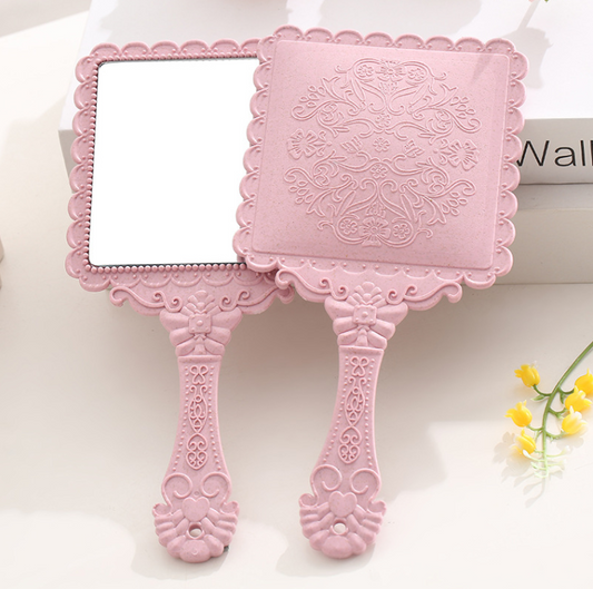 square antique hand mirror