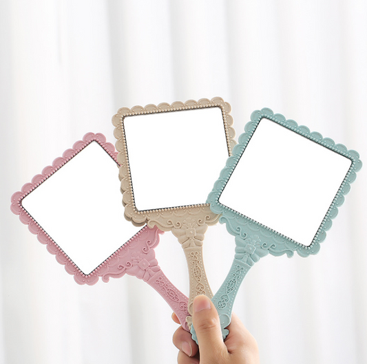 square antique hand mirror