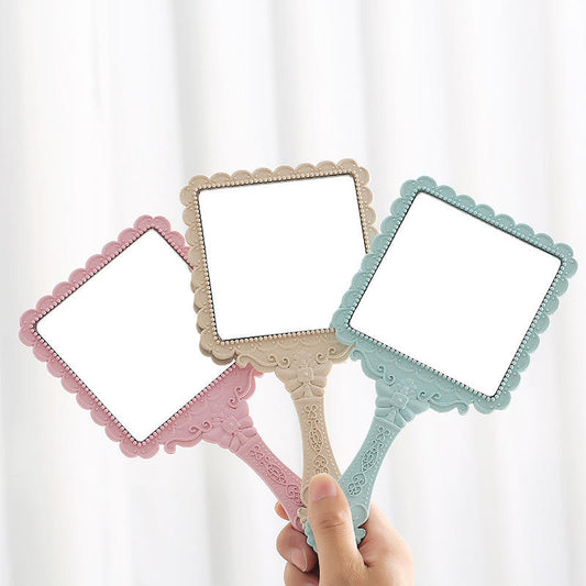 square antique hand mirror
